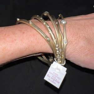 Set of 5 Lia Sophia brushed gold and crystal hard bangle bracelets